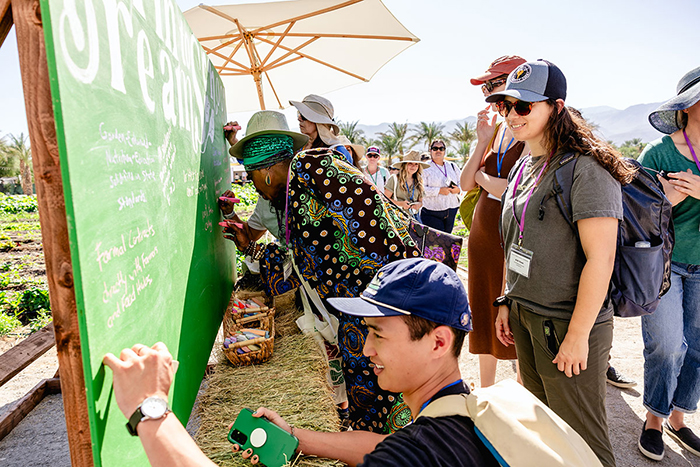 CDFA attendees writing on a board